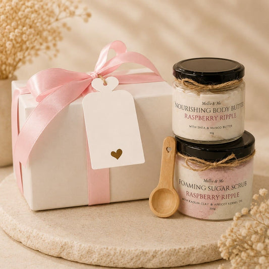 Handmade bath and body gift set with Raspberry Ripple body butter, foaming sugar scrub and gift box, beautifully wrapped for the perfect self-care gift.