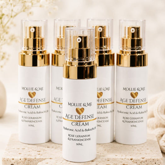 Mollie & Me Age Defense Cream, a handmade hydrating face cream with hyaluronic acid and botanical ingredients for soft, healthy-looking skin.