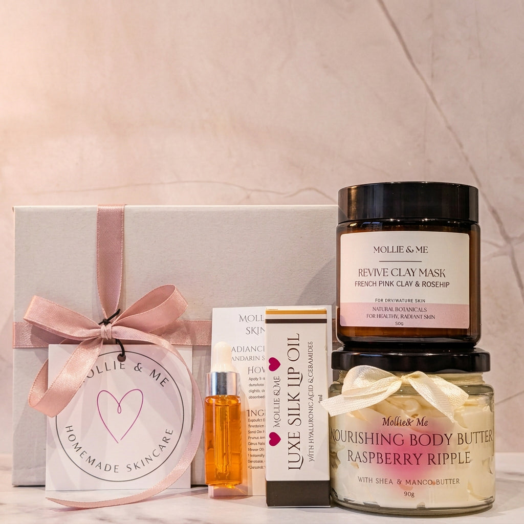 A skincare pamper giftset by Mollie & Me, featuring a Shea body butter, a french pink clay and rosehip clay mask, a luxe Silk Lip oil and a trial size radiance facial oil. All made with natural ingredients and handmade in small batches in Kent.