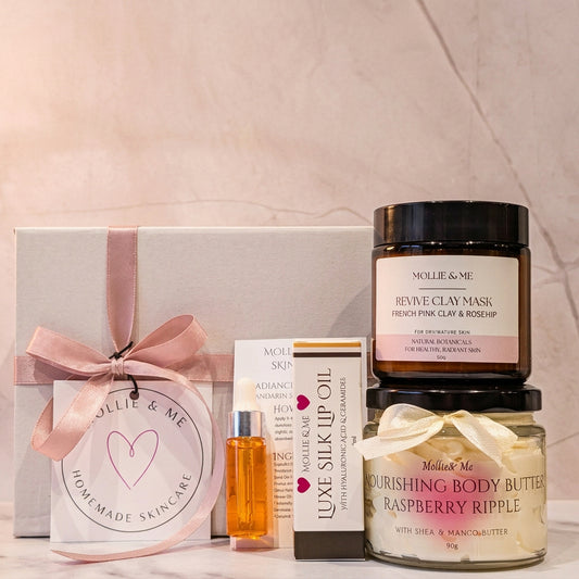 A skincare pamper giftset by Mollie & Me, featuring a Shea body butter, a french pink clay and rosehip clay mask, a luxe Silk Lip oil and a trial size radiance facial oil. All made with natural ingredients and handmade in small batches in Kent.